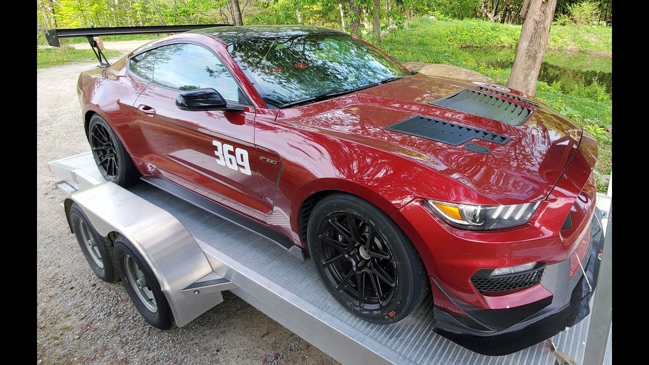 GT350 at Pitt Race catching Ferrari 458 Competizione on lap 12