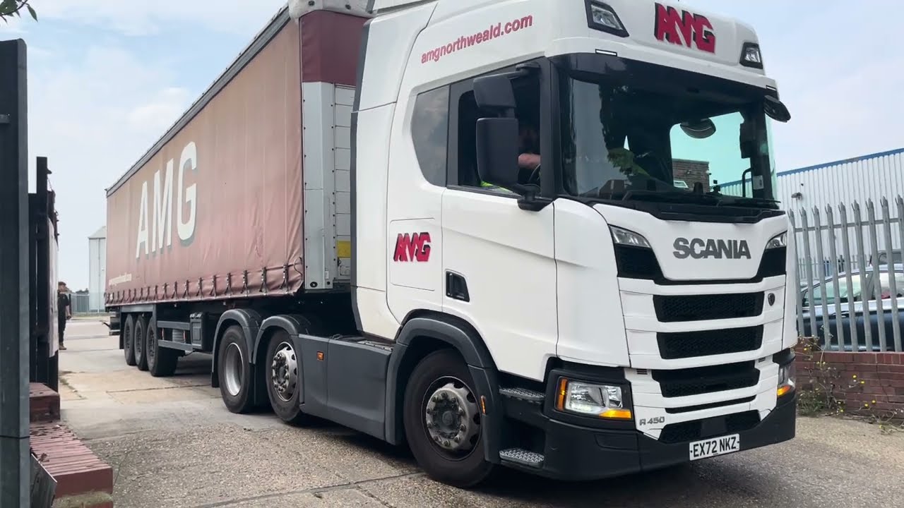 Rookie trucker backs into narrow yard no fuss