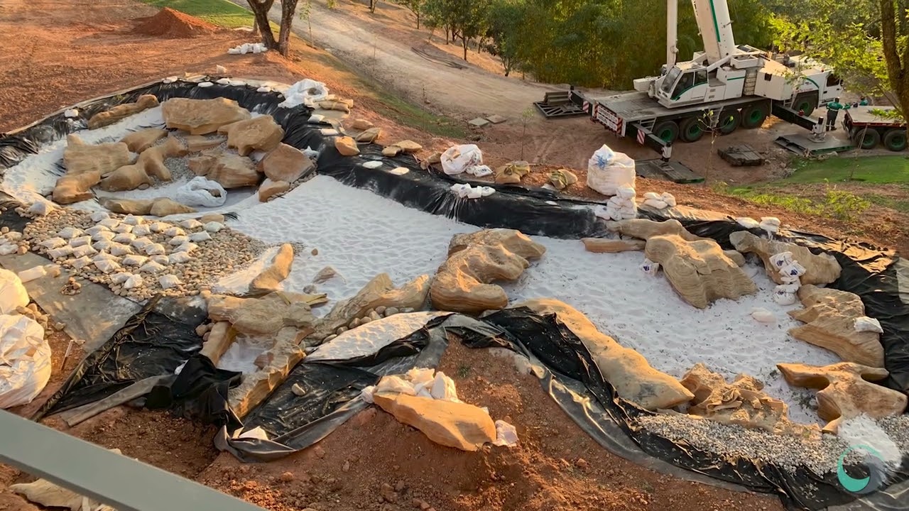 Piscina natural entre as casas - ECOSYS