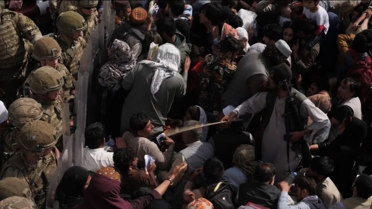 Thousands crowd Kabul's airport in hopes of escape