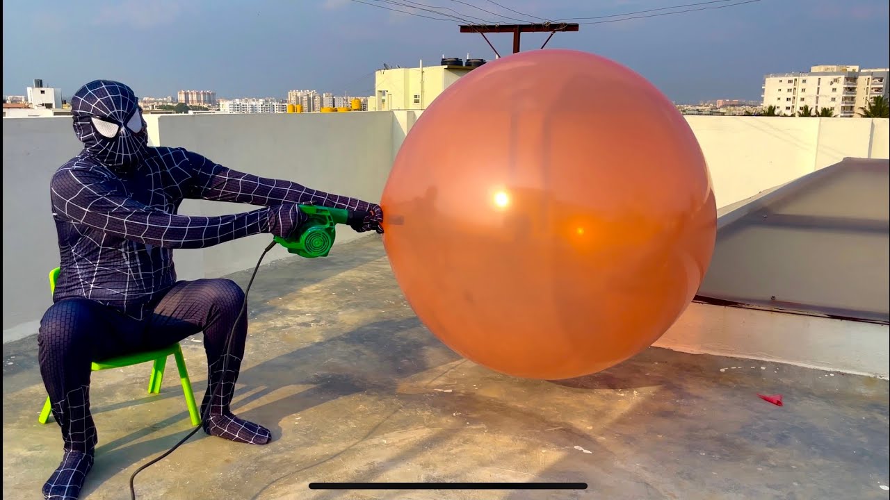Venom popping giant balloon, big balloon popping