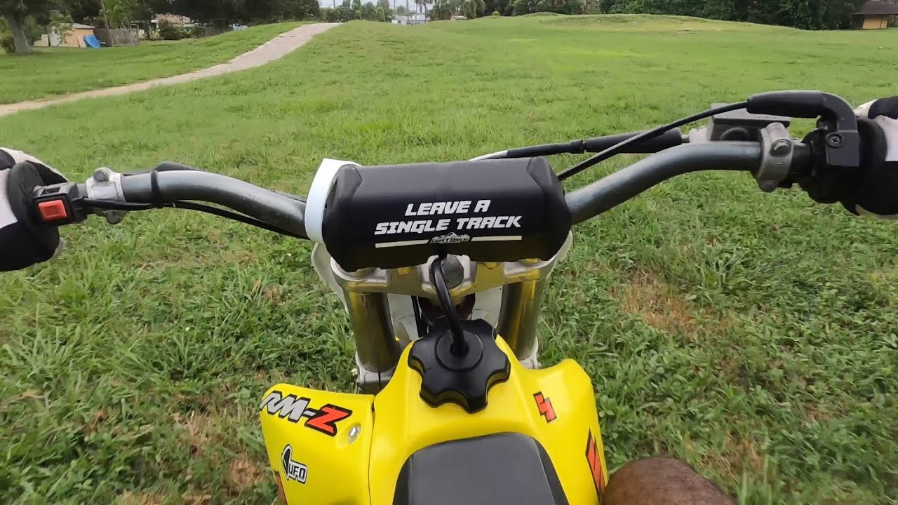 Suzuki rm 85 riding in abandoned gulf field
