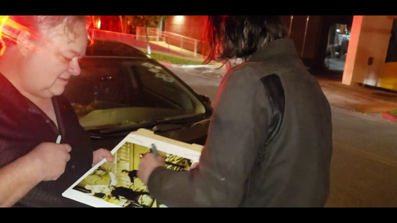 Keanu Reeves in Beverly Hills  signs AUTOGRAPHS