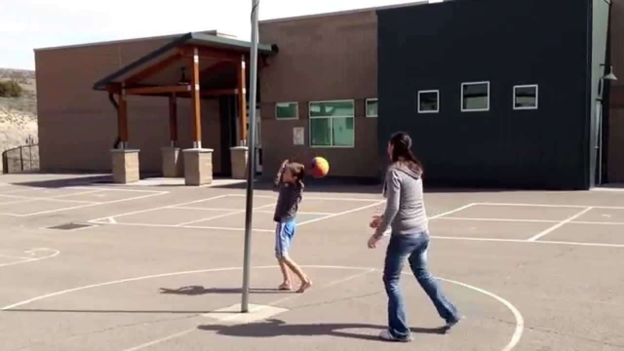 Mom & Aidan tetherball.
