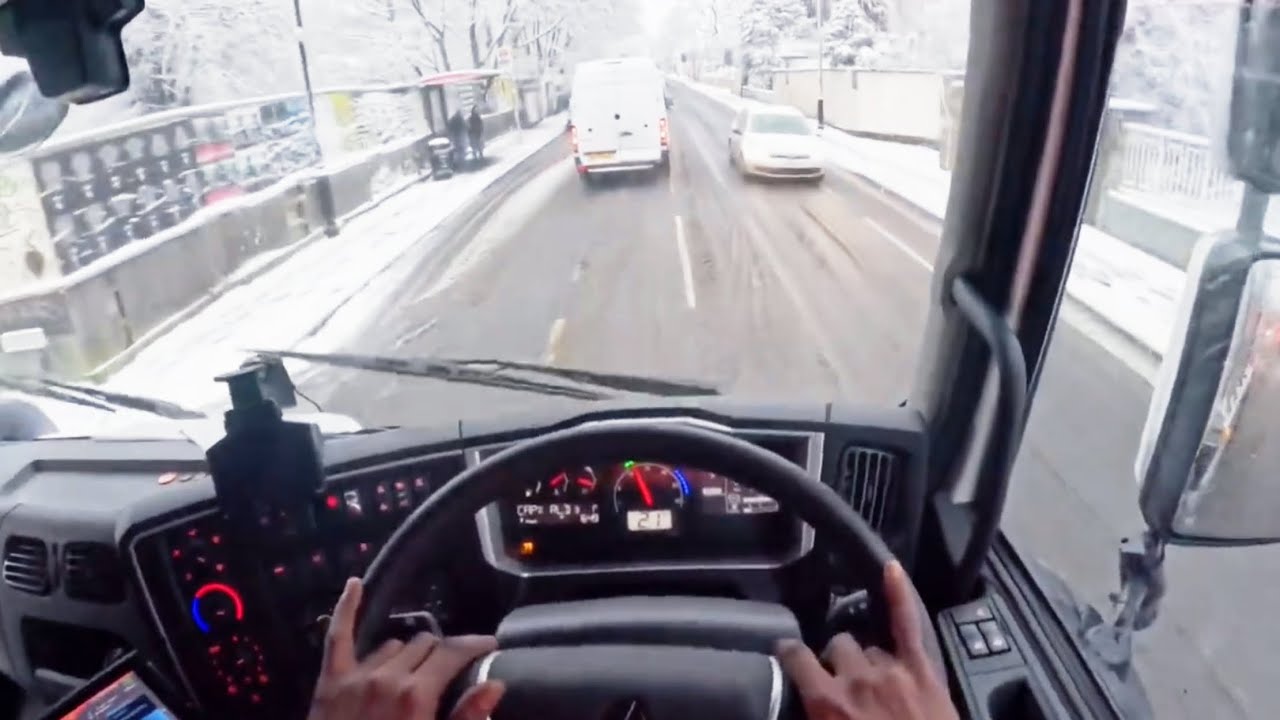 Bin collection in the snow as a solo driver in London neighbourhoods