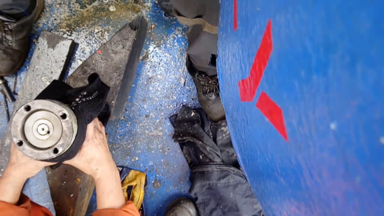 Dismantling cylinder brake for deck crane.