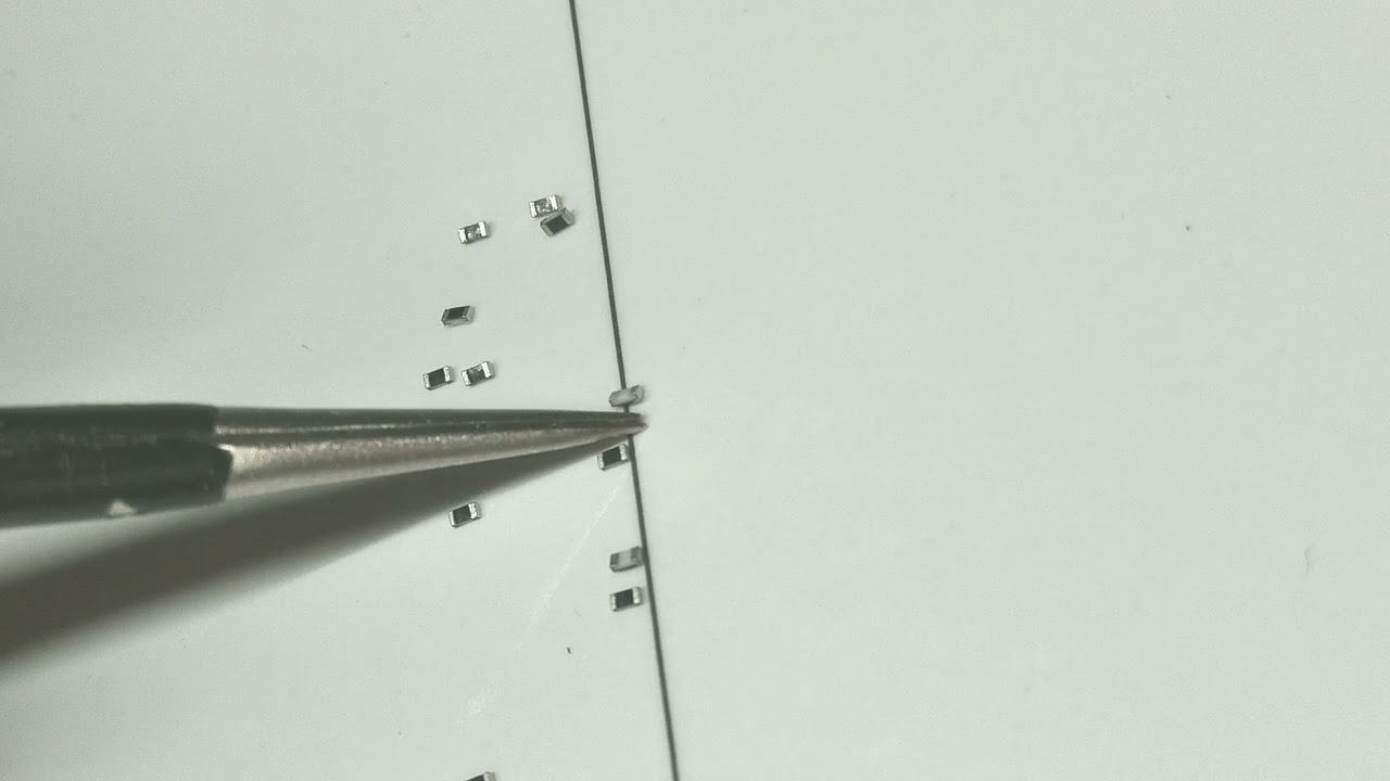 Flipping SMD resistors using a magnetic project mat