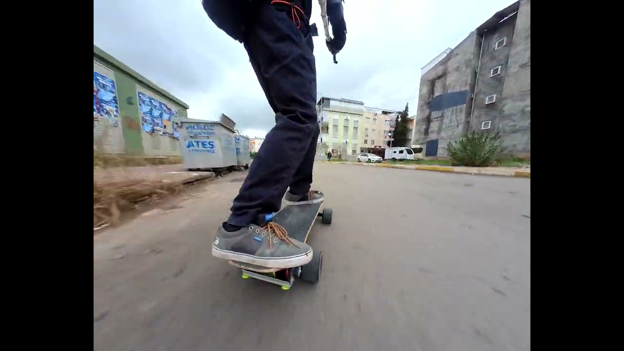 DIY electric skateboard ripping after rain in Antalya.