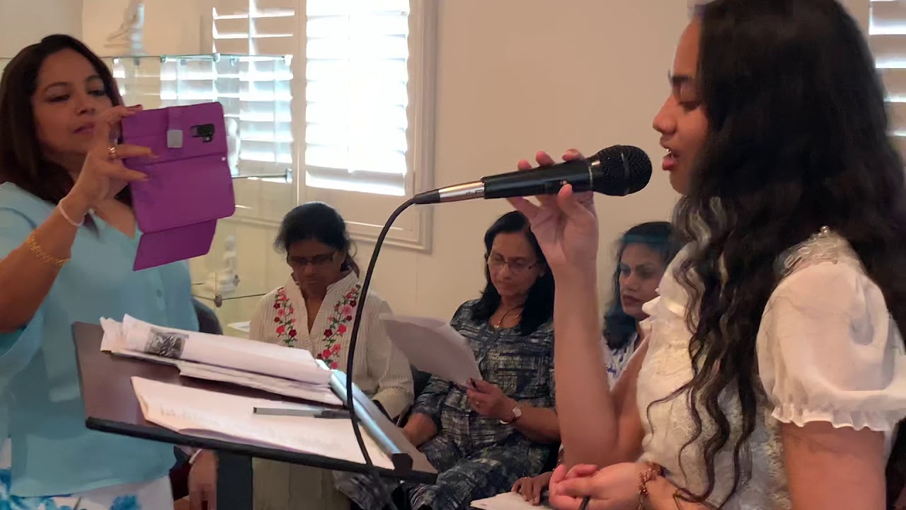 Sanjani De Mel singing while prod mom Sanjeewani Weerasinghe is recording..