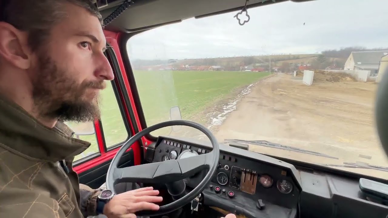 Driving Tatra 815 unloaded truck in forest and hills