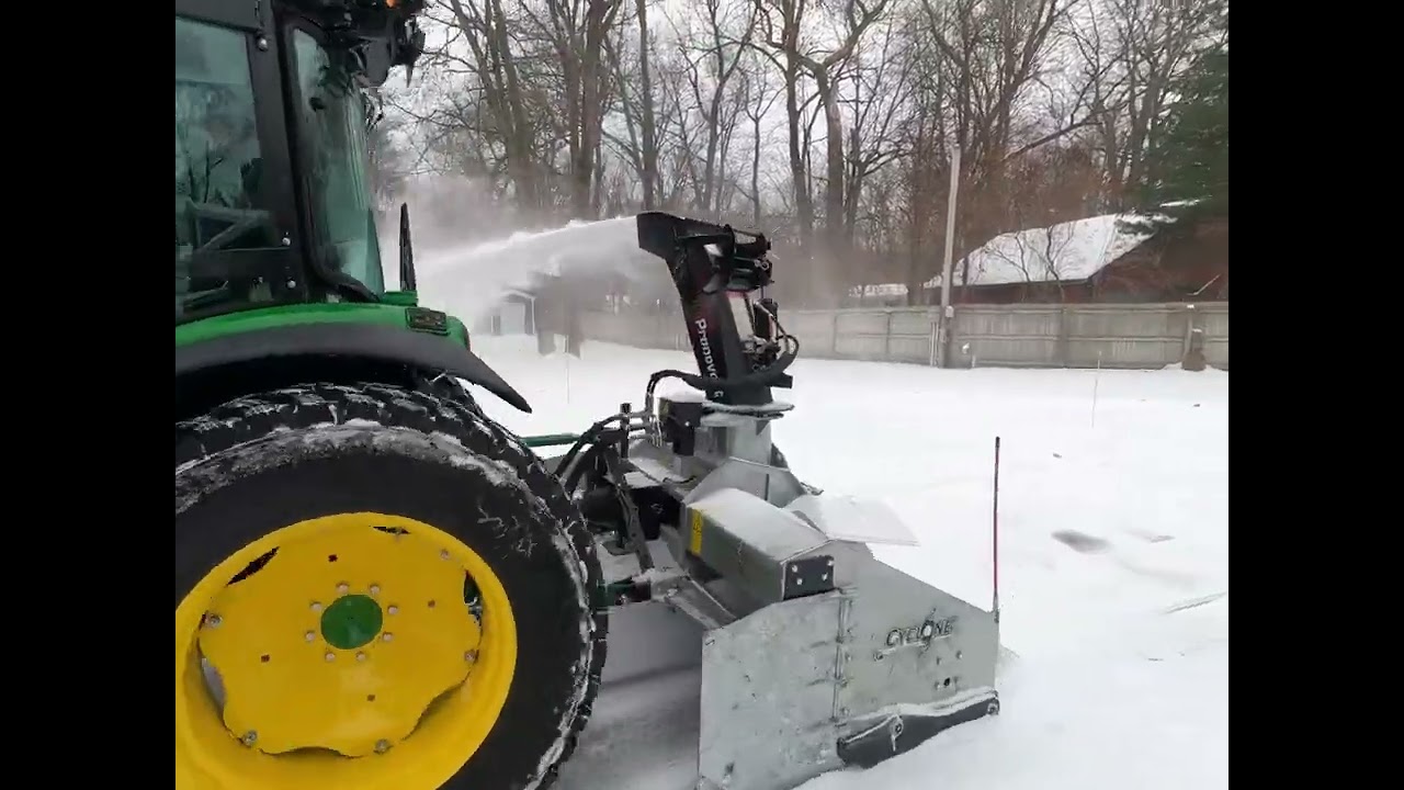 Snow removal done by a 2024 John Deere 4066R with an 82