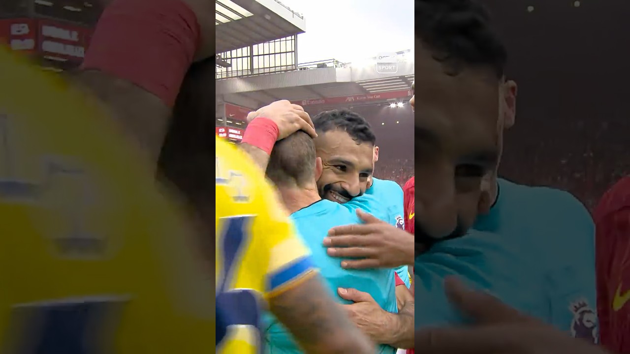 Mohamed Salah embraces retiring offical Derek Eaton as he hangs up the whistle 🥹
