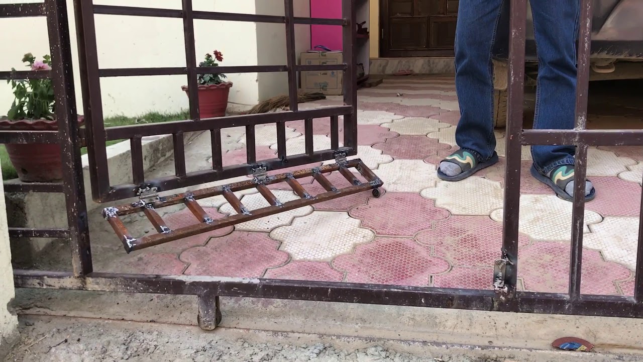Simple gate design for slope area car porch