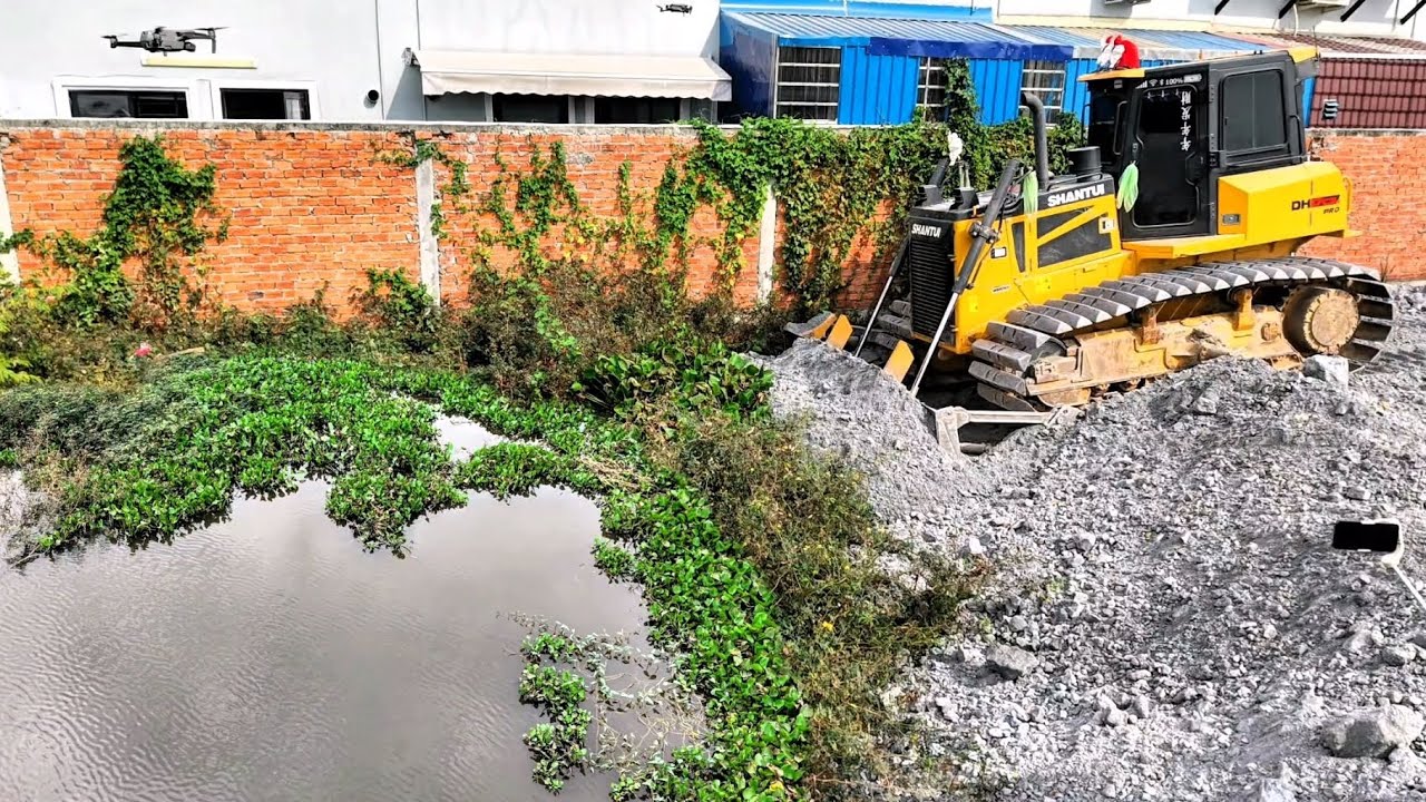 Nicely Bulldozer Push The Soil The Hole Building Skill Stones Using Water Very into Deep Perfect