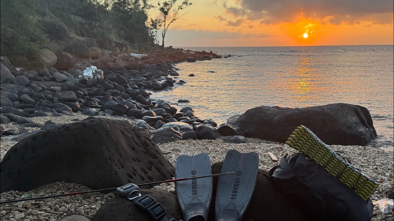 Spearfishing a Kauai beach for mealprep before class on Oahu
