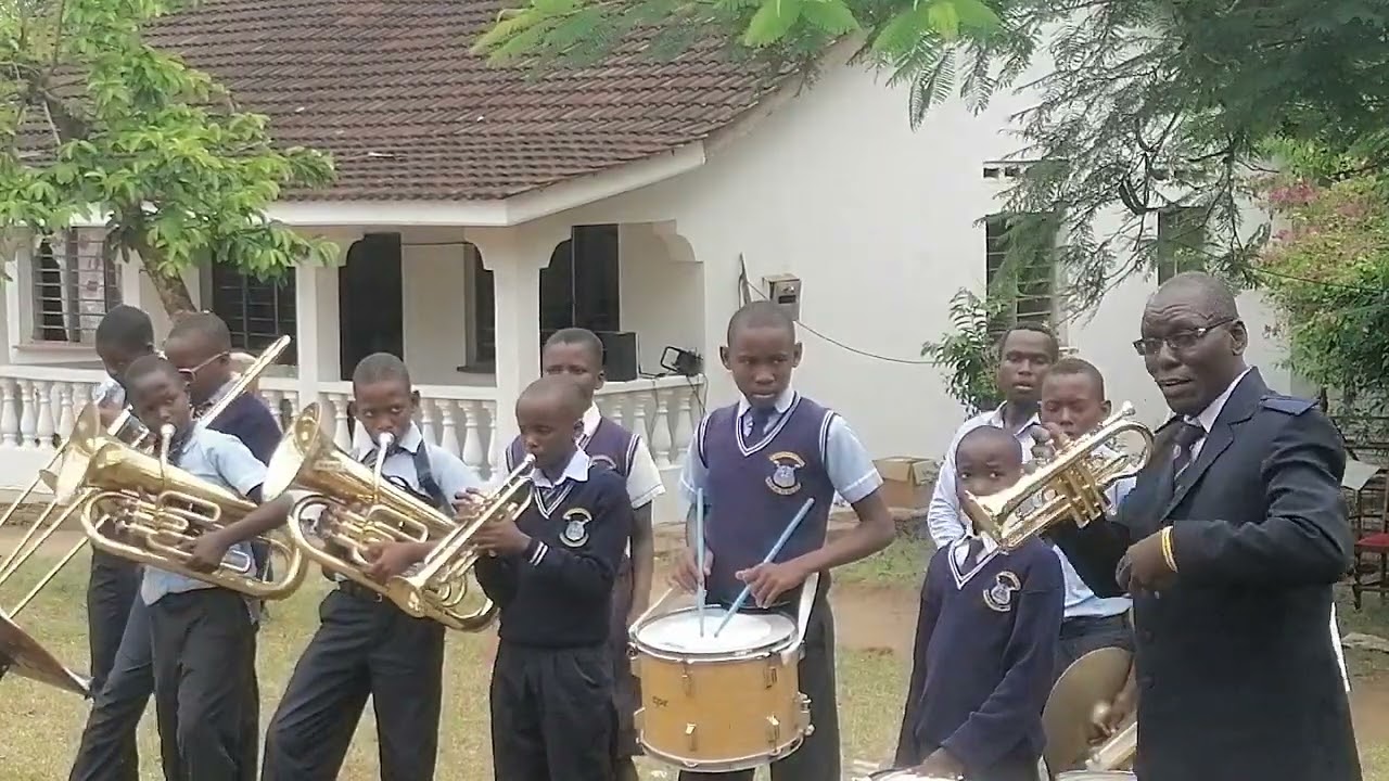 ST CLARET TEACHERS CHOIR AND BAND AT SHIMBA HILLS MWALUMBA-FARWELL THEE GLADYS MATANO