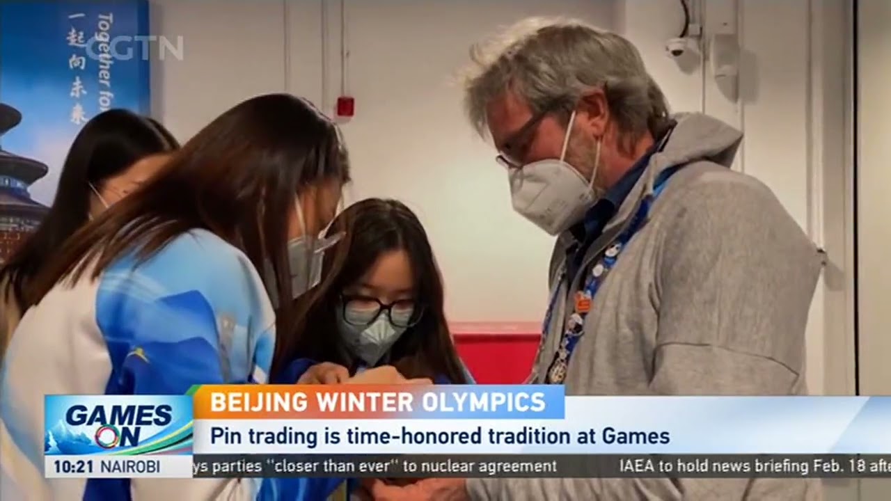 Beijing 2022 | Athletes and media bond through trading pins.