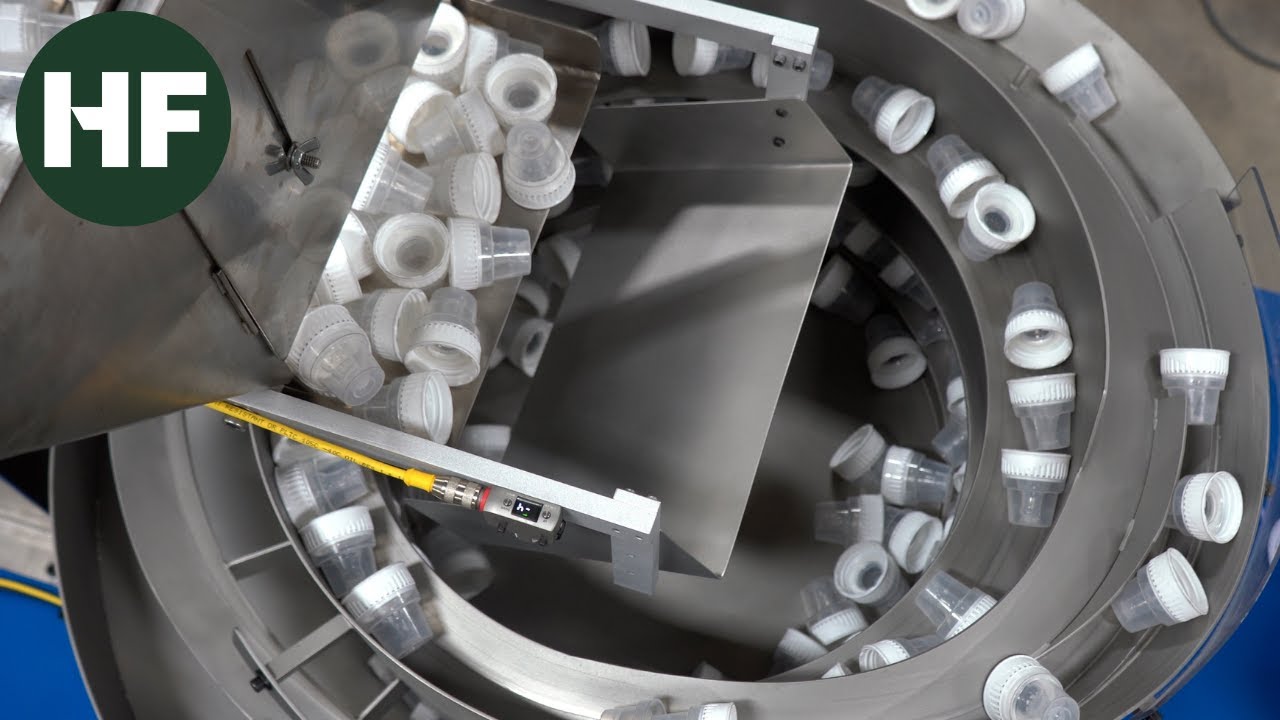 Vibratory Feeder System for Plastic Baby Bottle Caps