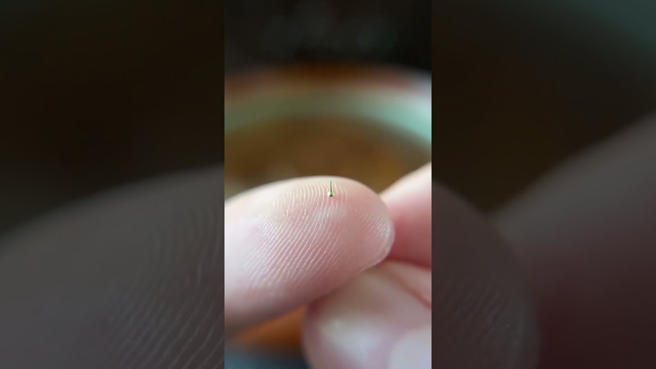 Smallest spinning top in the world! #mini #miniature #unboxing #guinessrecords