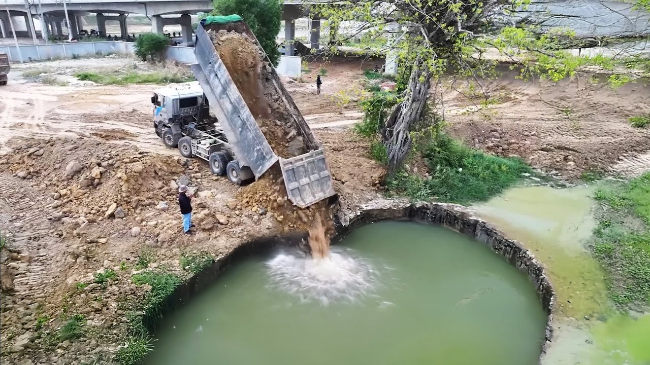 Starting the project using a Komatsu D53p Dozer, pushing soil into the pond with 25.5ton dump truck