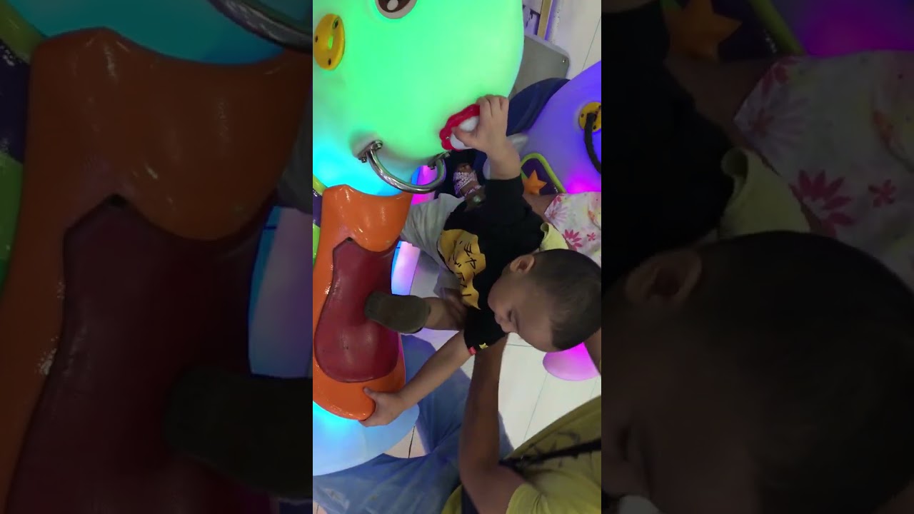 Jayzam riding in a dolphin