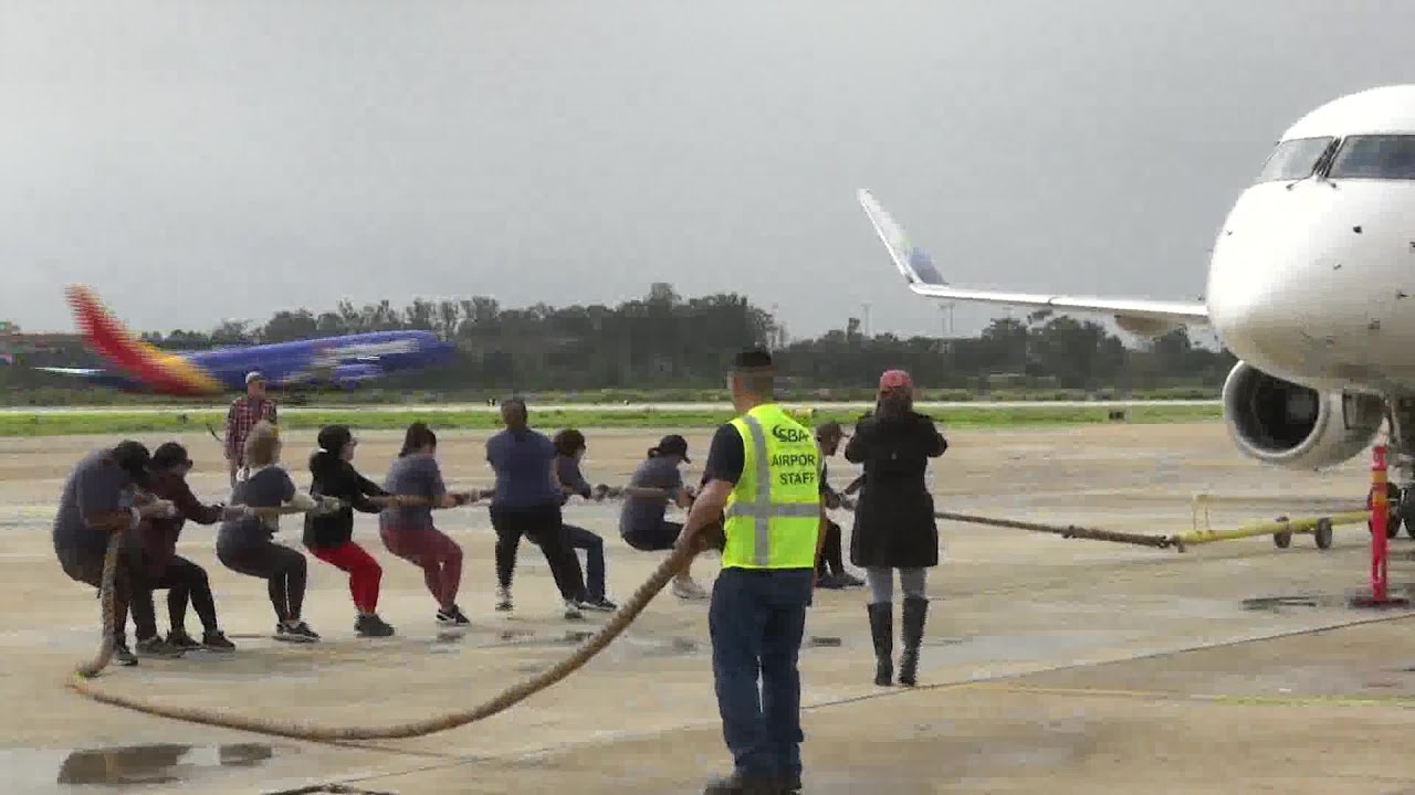 Plane Pull helps Alpha Resource Center