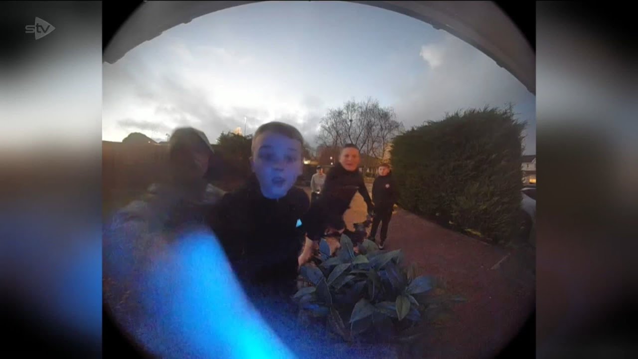 'Scotland's Christmas advert': Boys spread festive cheer with doorstep rendition of Last Christmas.