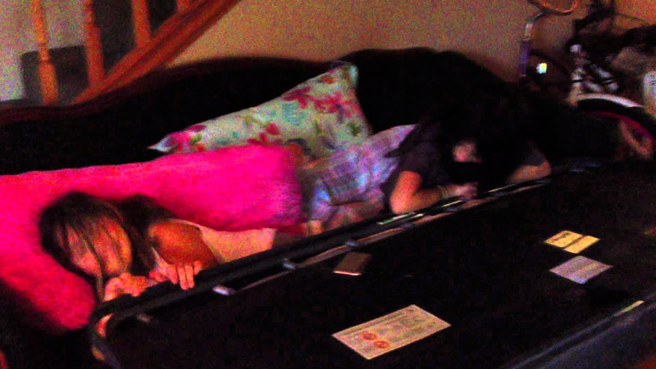 Girls get stuck in sofa bed