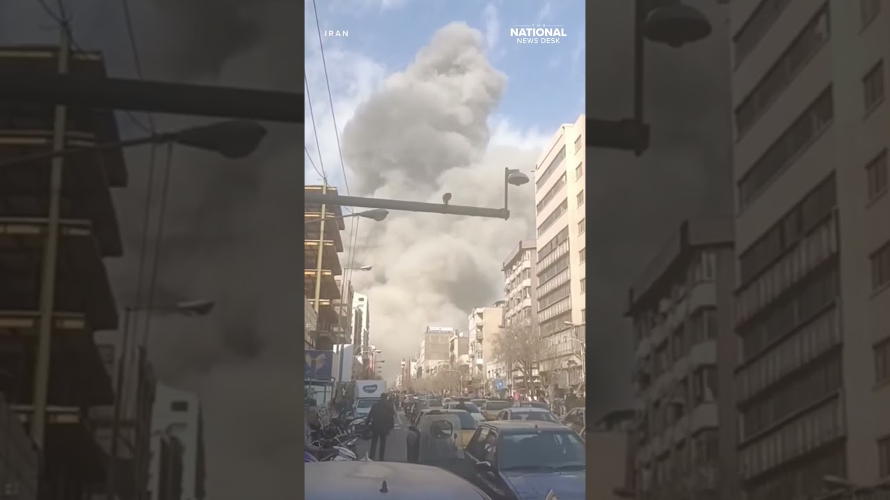 Drone video shows US & ISRAEL STRIKES ON IRAN; Smoke rises above TEHRAN