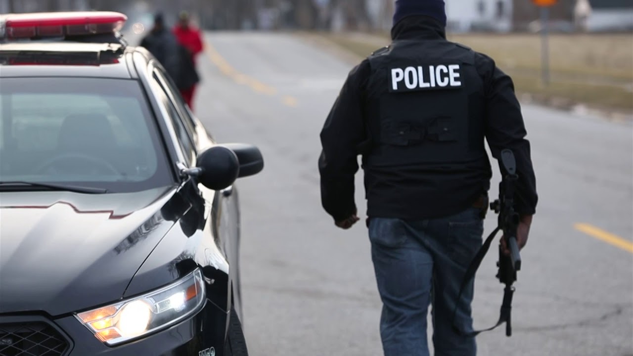 Saginaw Police raid home at scene of homicide near Janes and 19th Streets