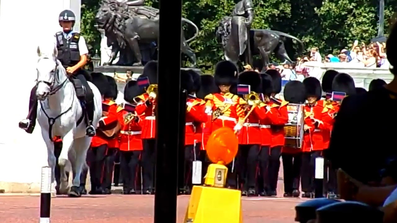 Changing The Guard: Senior Drum Major Damian Paul Thomas leading Band Of The Scots Guards