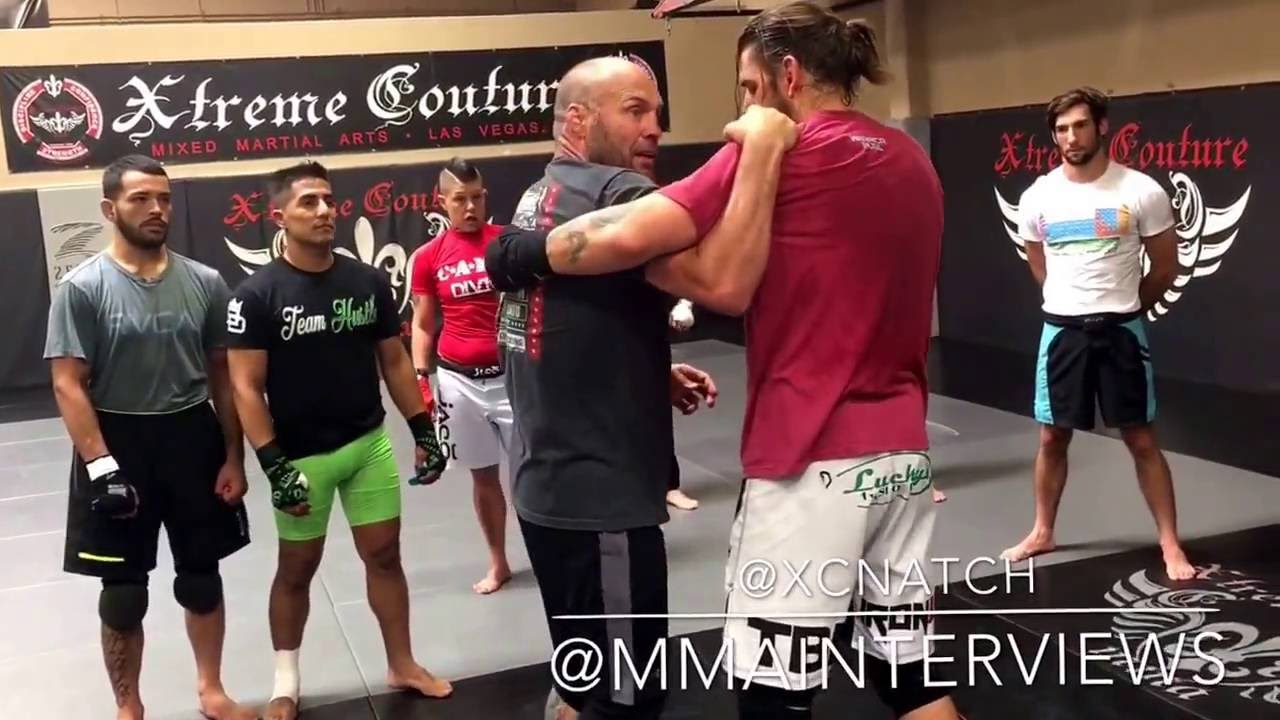 Randy Couture showing some clinch technique at Xtreme Couture for the pro practice
