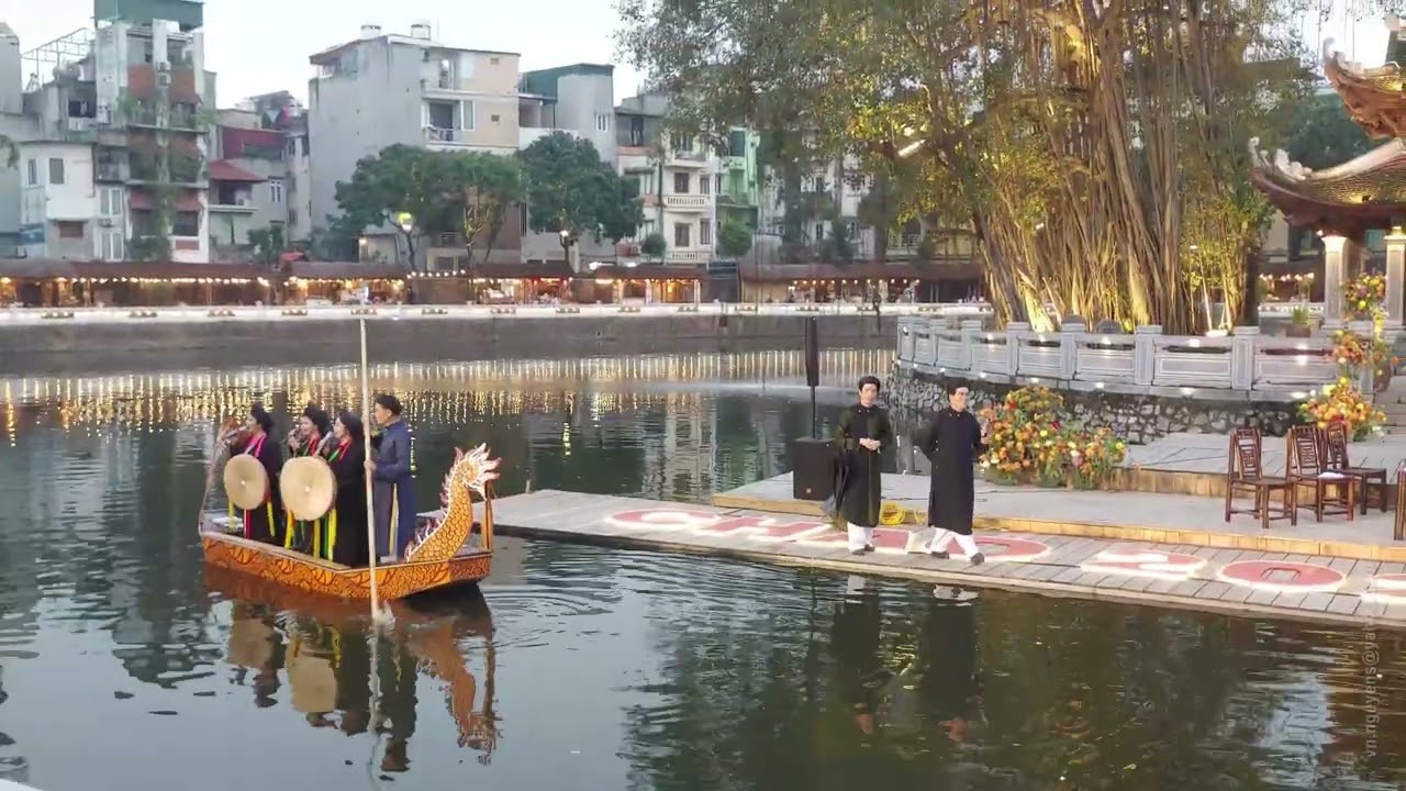 012 THUYỀN MỞ LÁI CHÈO