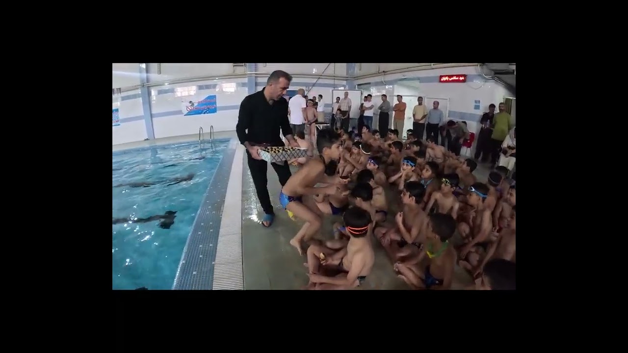 فێستیڤاڵی مەلەوانی وخەڵاتکردنی پاڵەوانی مەلەوانیSwimming festival and awarding of swimming champions