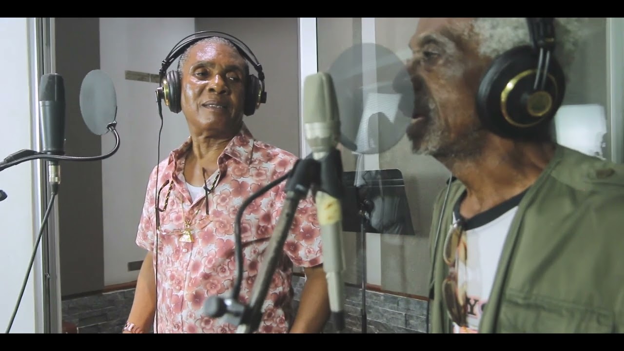 KEN BOOTHE & CARLTON MANNING 