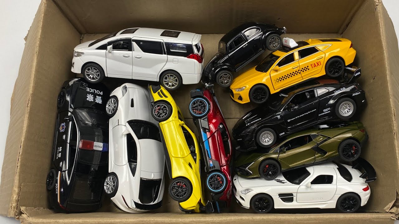 Box Full of Model Cars -Mazda Mx5, Koenigesgg Jesko, Lamborghini Scv12, Byd Yang Wang U8, Toyota Car