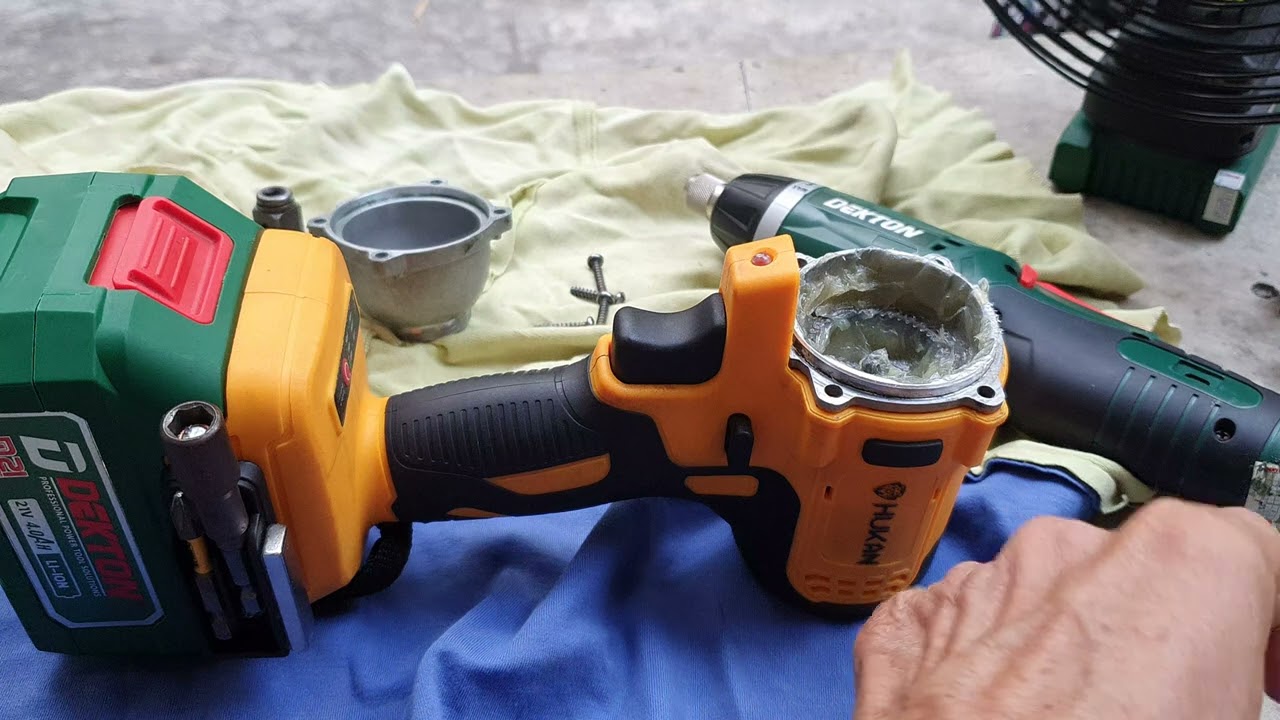 Thay đầu T 2 trong 1 loại sâu lòng, bi gài và thay mỡ bò chịu nhiệt cho máy siết bulong Hukan F80