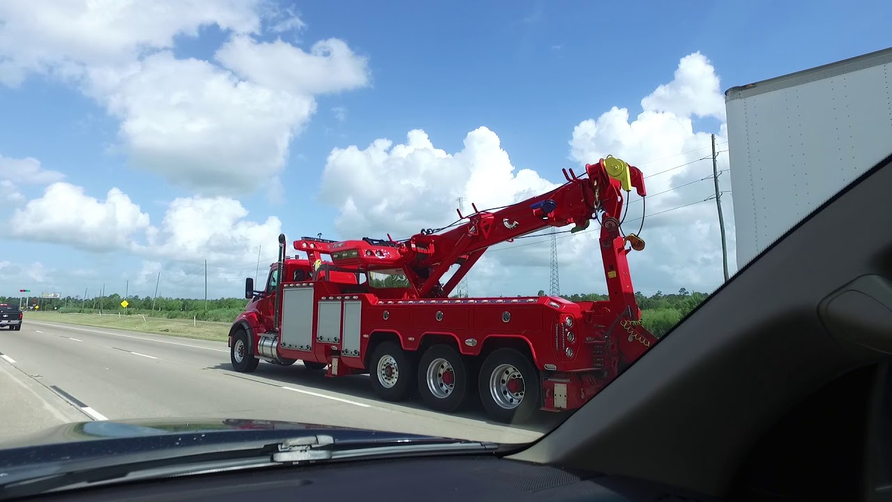 Kenworth T880 Heavy Wrecker with a NRC 50/65 CSR Sliding Rotator
