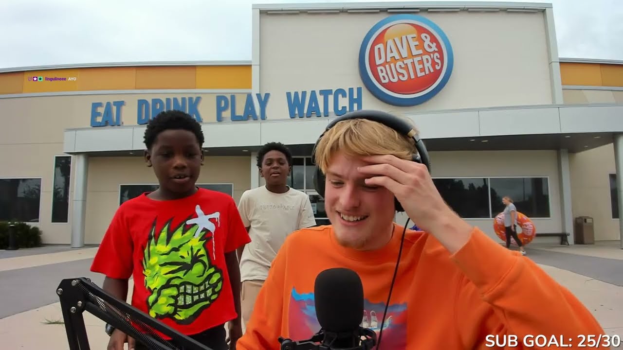 playing an arcade simulator outside of Dave & Buster's