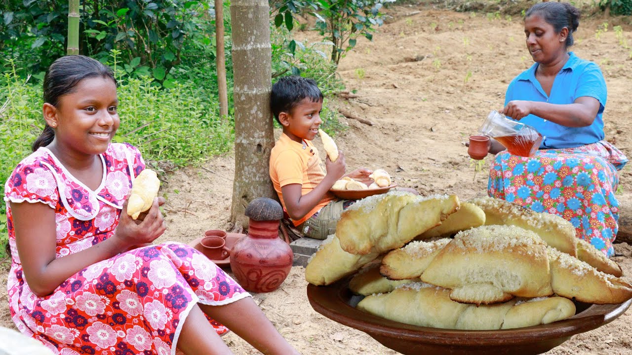Sugar coated buns.. Buns made easily in the home wood stove. (Kibula buns) .village kitchen recipe