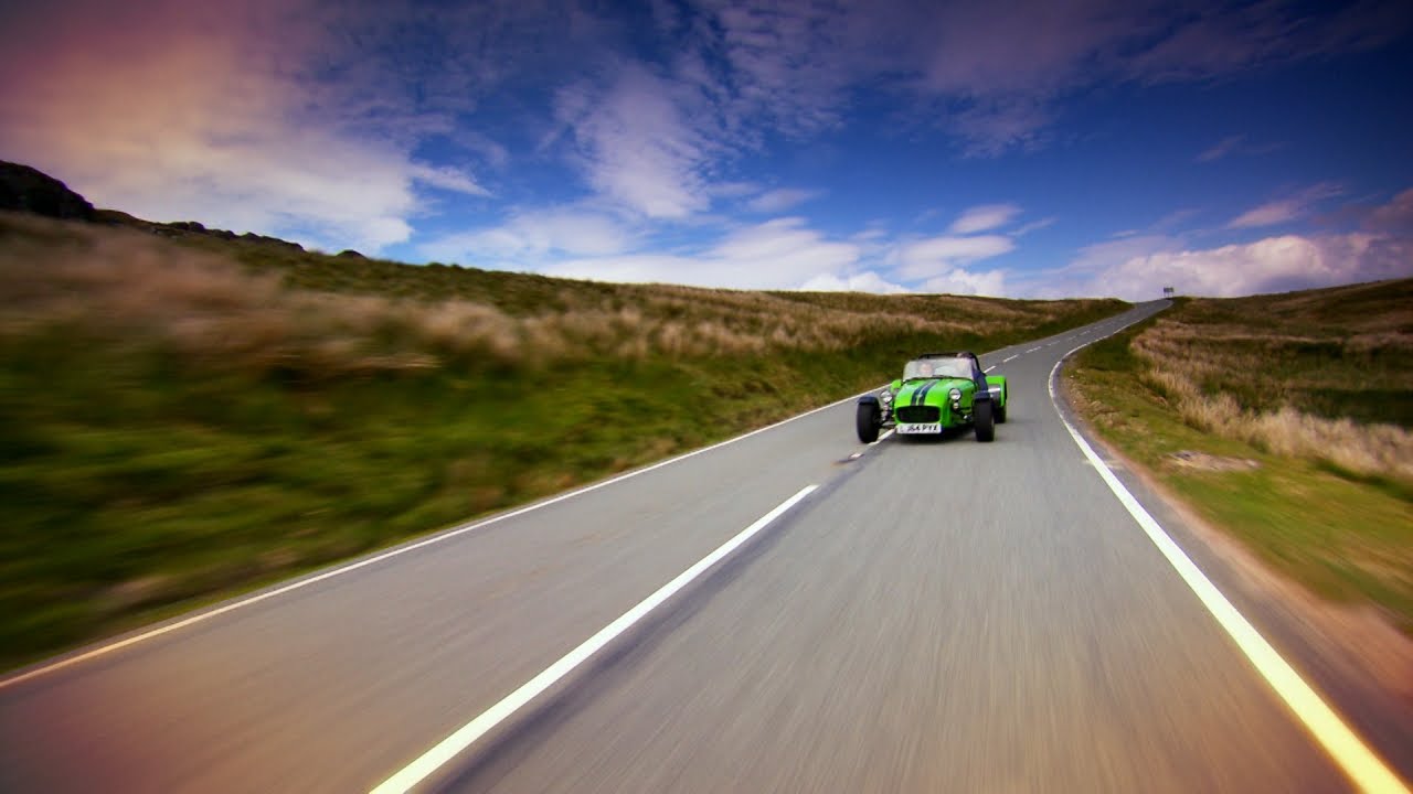 A Caterham 7 Rumbles Through the Countryside