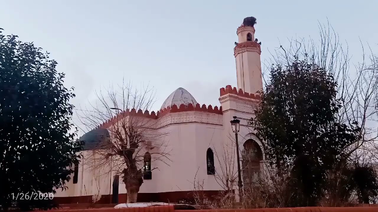 أذان المرحوم عزوزي لزهاري في المسجد العتيق بمدينة افلو