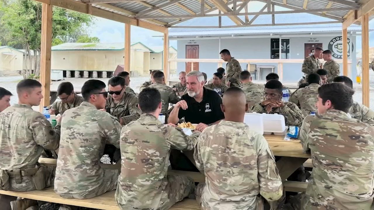 Indiana Gov. Eric Holcomb shares early Thanksgiving with US troops stationed in Kenya