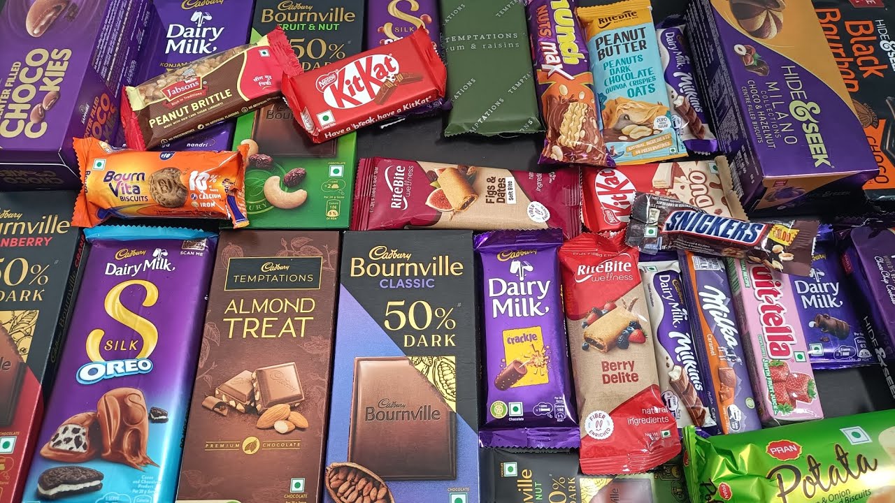 Some lots of New chocolates 🍫🍫#chocolates #cookies #almondtreat #snickers #bournville 
