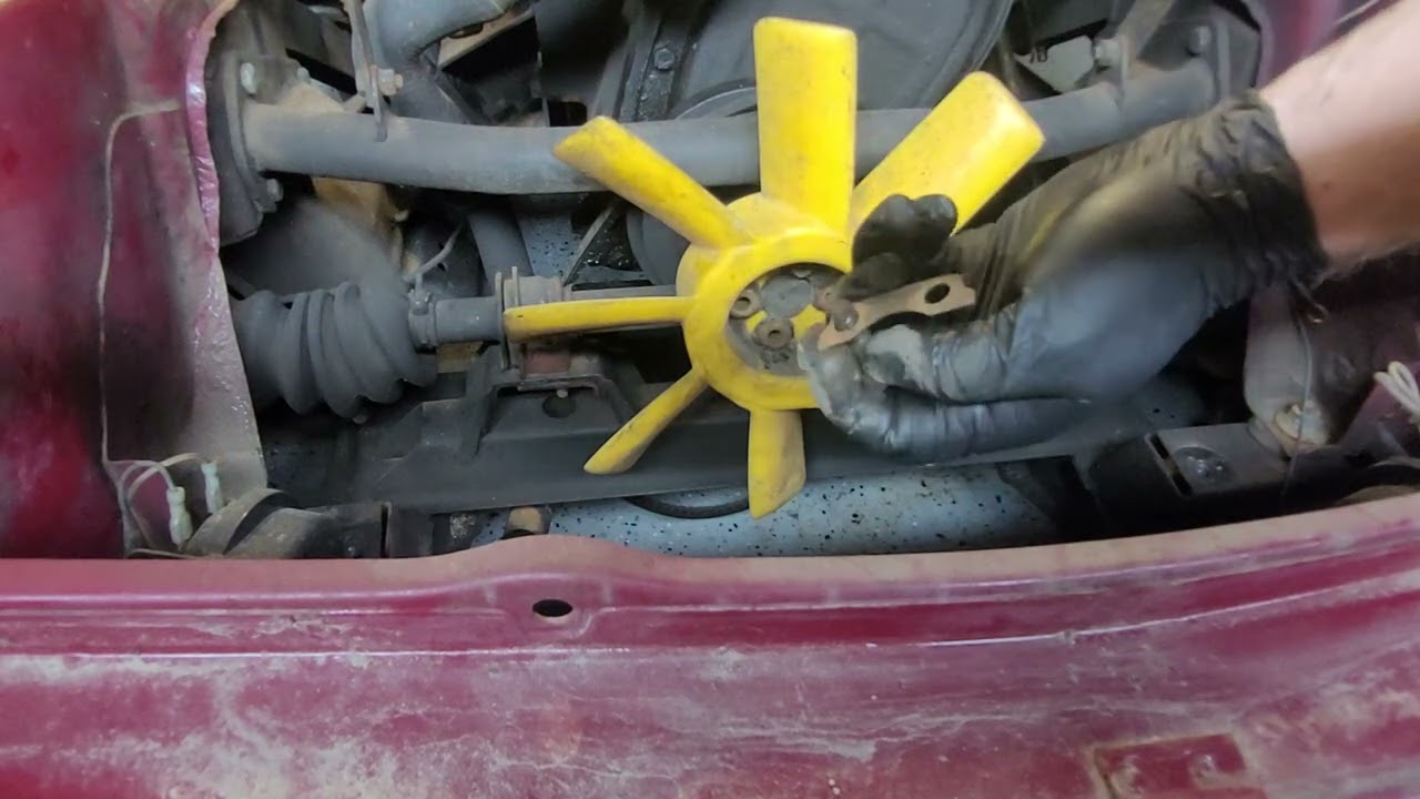 Triumph tr6 engine removal part 4:  Removing alternator, fan, fuel pump, cross brace, and Throttle