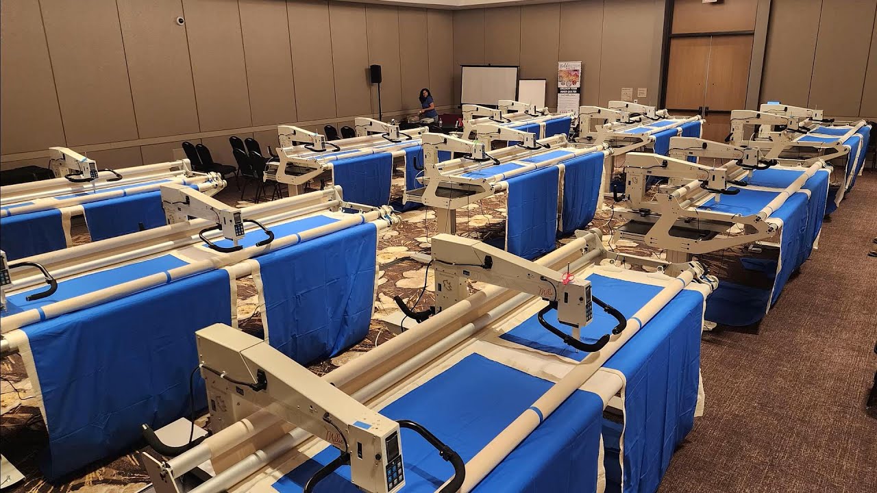 APQS setting up a longarm classroom with 9 Comfort tables and 18 Millies