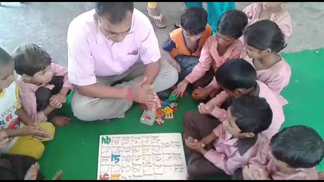 Saharanpur Commissioner taking class in primary school