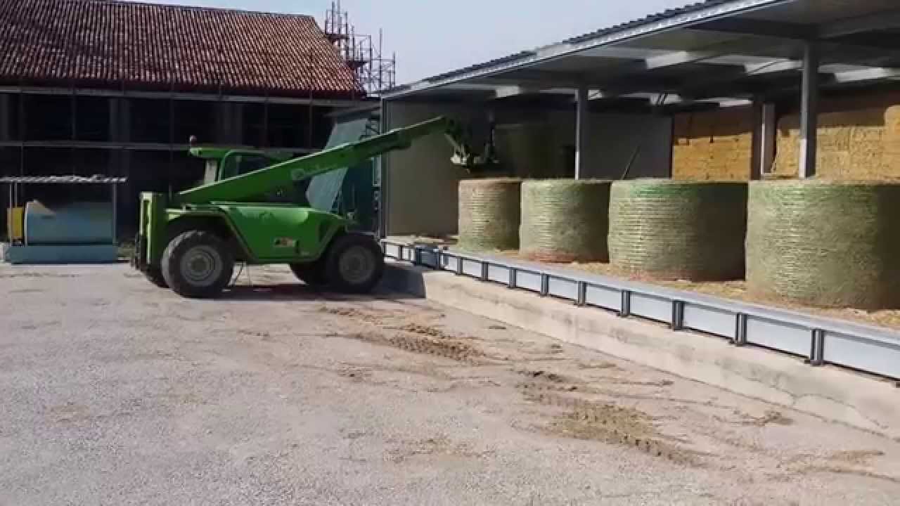 AgriCompact Technologies GmbH:  unloading alfalfa hay bales  from our Hay Dryer