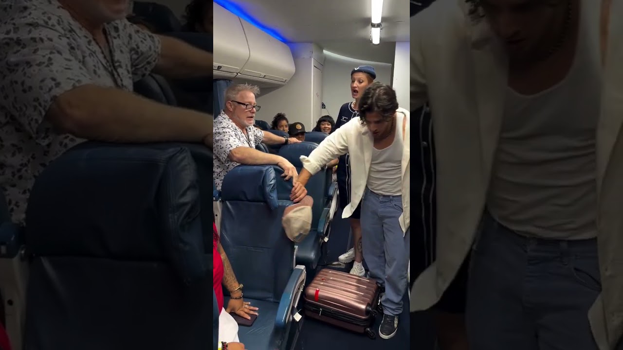 Rude man throws passenger's luggage and gets into a fight #The Rodrigo show