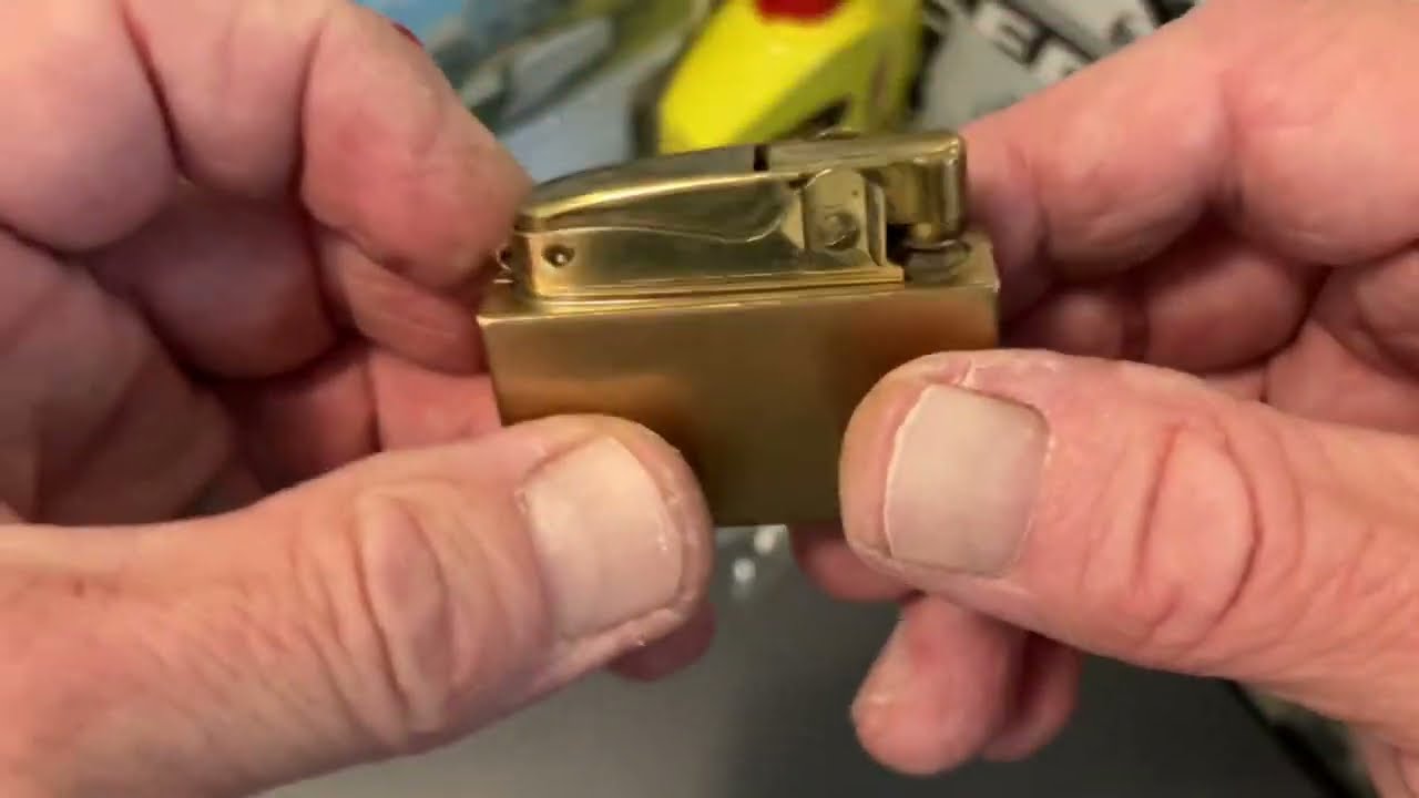 How To Disassemble A Japan Made Automatic Lighter, Clear The Flint Tube & Replace The Flint Spring